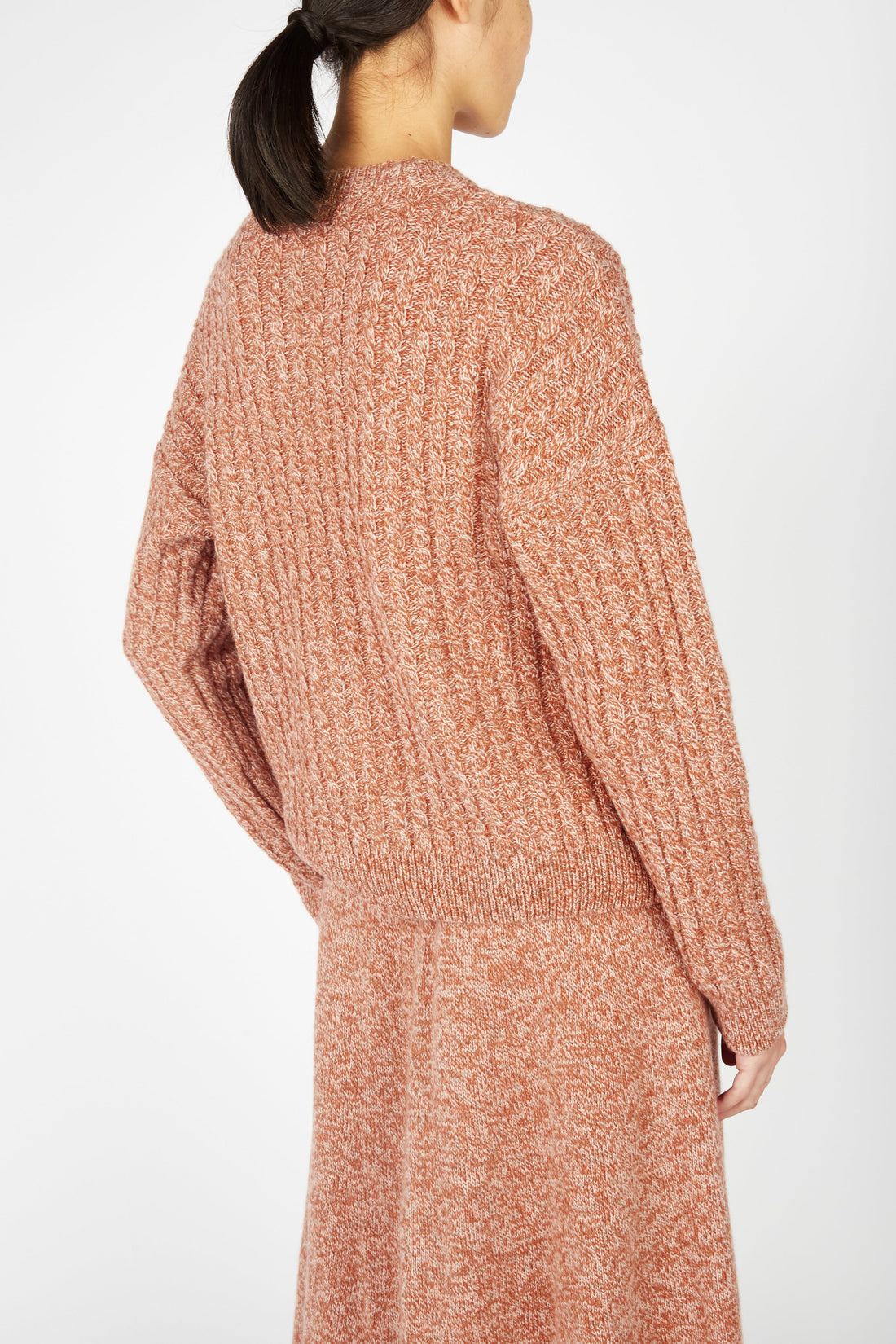 Irish Corbin Cable Crew Neck in Cedar Marl from the back.