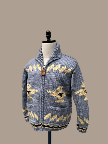 Canadian Knit Sweater in Light Blue/Yellow on a mannequin