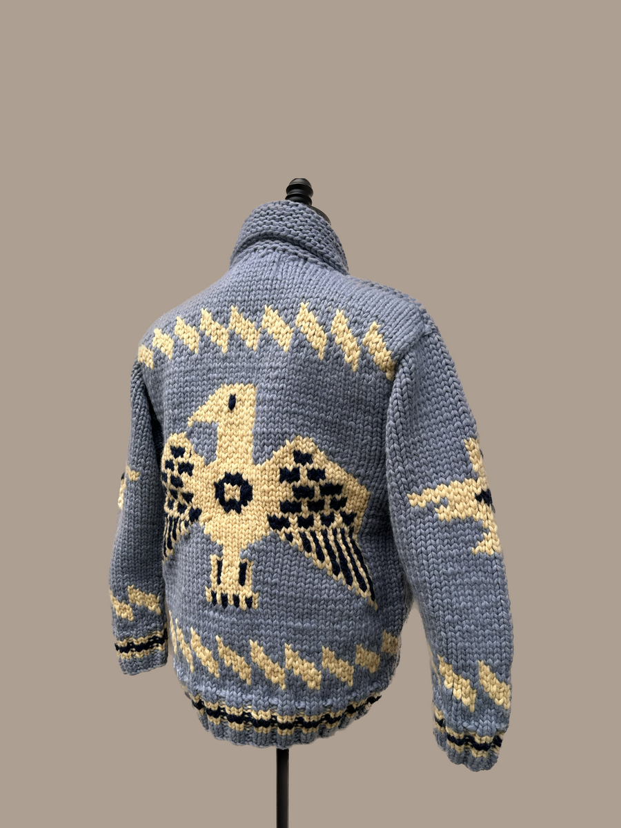 Canadian Knit Sweater inLight Blue/Yellow on a mannequin from behind